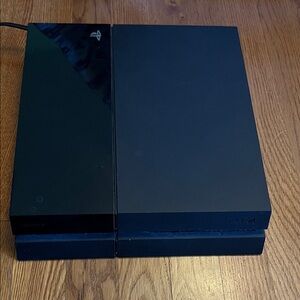 Sony Gaming Console - Sleek Black Design *unknown condition*